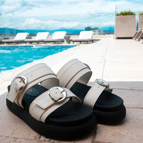 White sandals by a poolside